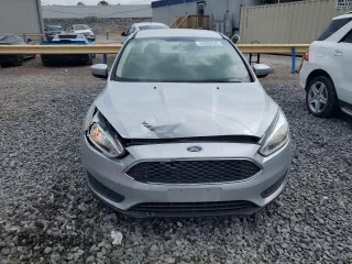 2018 Ford Focus SE z VIN 1FADP3F27JL250591, wystawiony jako Copart lot #54989245 z przebiegiem 85 838 mil mil oraz Szkoda całkowita • Salvage title. Historia ofert i sprzedaży dostępna na DreamBid. Obrazek 5.