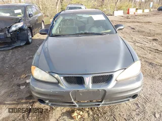 2005 Pontiac Grand Am SE with VIN 1G2NE52E75M151497, listed as a IAAI auction lot 40847757 with 140,300 mi miles. Bid and sale history available at carsss.com. Image 12.