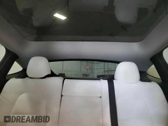 2021 Tesla Model Y Long Range with VIN 5YJYGDEE8MF252824, listed as a Copart auction lot 53801315 with 31,084 mi miles and Salvage Title. Bid and sale history available at DreamBid. Image 10.