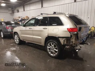 2015 Jeep Grand Cherokee Summit with VIN 1C4RJFJG5FC918837, listed as a IAAI auction lot 41126436 with 155,516 mi miles. Bid and sale history available at carsss.com. Image 3.