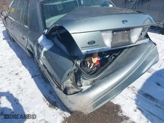2005 Ford Crown Victoria LX with VIN 2FAFP74W85X131494, listed as a IAAI auction lot 41620849 with 127,245 mi miles. Bid and sale history available at carsss.com. Image 6.