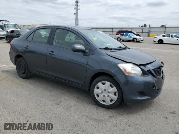 2012 Toyota Yaris with VIN JTDBT4K38CL036729, listed as a Copart auction lot 53514995 with 232,180 mi miles and Salvage Title. Bid and sale history available at DreamBid. Image 4.