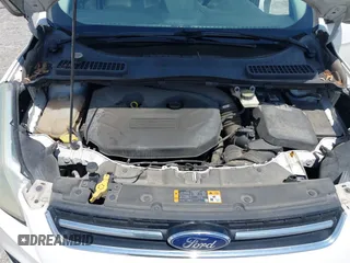 2013 Ford Escape SEL z VIN 1FMCU0H94DUD22476, wystawiony jako IAAI lot #42673808 z przebiegiem 215 811 mil mil oraz . Historia ofert i sprzedaży dostępna na DreamBid. Obrazek 10.