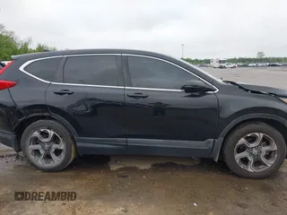 2017 Honda CR-V EX with VIN 7FARW1H59HE007171, listed as a IAAI auction lot 42033941 with 134,227 mi miles and . Bid and sale history available at carsss.com. Image 13.