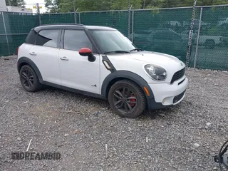 2012 MINI Countryman S z VIN WMWZC5C54CWL58610, wystawiony jako IAAI lot #42372195 z przebiegiem 133 556 mil mil oraz . Historia ofert i sprzedaży dostępna na DreamBid. Obrazek 1.