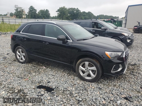 2020 Audi Q3 Premium with VIN WA1AECF35L1088335, listed as a Copart auction lot 65602815 with 53,926 mi miles and Salvage title. Bid and sale history available at DreamBid. Image 4.