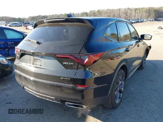 2022 Acura MDX w/A-Spec Package with VIN 5J8YE1H02NL002158, listed as a IAAI auction lot 41633998 with 105,000 mi miles. Bid and sale history available at carsss.com. Image 4.