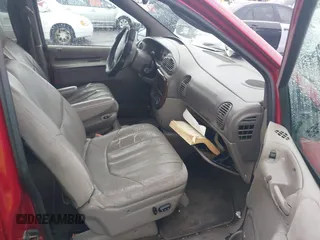 1999 Chrysler Town & Country with VIN 1C4GT64L7XB723937, listed as a IAAI auction lot 41609957 with 242,800 mi miles and . Bid and sale history available at DreamBid. Image 5.