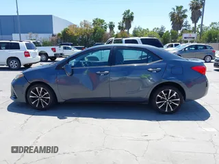 2017 Toyota Corolla L with VIN 5YFBURHE6HP575352, listed as a IAAI auction lot 42417810 with 248,626 mi miles and . Bid and sale history available at DreamBid. Image 14.