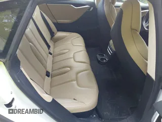 2017 Tesla Model S 100D z VIN 5YJSA1E28HF199074, wystawiony jako IAAI lot #42449671 z przebiegiem 172 910 mil mil oraz . Historia ofert i sprzedaży dostępna na DreamBid. Obrazek 8.