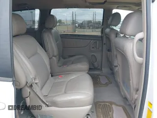 2004 Toyota Sienna XLE with VIN 5TDZA22CX4S141877, listed as a IAAI auction lot 42135971 with 219,688 mi miles. Bid and sale history available at carsss.com. Image 8.