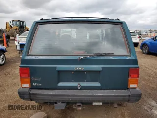 1996 Jeep Cherokee Sport with VIN 1J4FJ68S3TL251074, listed as a Copart auction lot 59593955 with 181,482 mi miles and Salvage title. Bid and sale history available at DreamBid. Image 6.