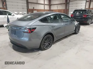 2024 Tesla Model 3 Long Range with VIN 5YJ3E1EB0RF860736, listed as a IAAI auction lot 41966827 with 5,134 mi miles and . Bid and sale history available at DreamBid. Image 4.