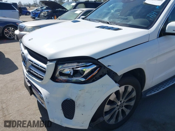 2018 Mercedes-Benz GLS 450 with VIN 4JGDF6EE6JB132415, listed as a IAAI auction lot 42283484 with 54,090 mi miles and . Bid and sale history available at DreamBid. Image 6.
