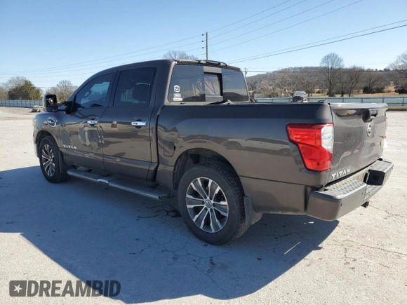 2017 Nissan Titan SL with VIN 1N6AA1E6XHN536809, listed as a Copart auction lot 47956345 with 135,207 mi miles and Salvage title. Bid and sale history available at DreamBid. Image 2.
