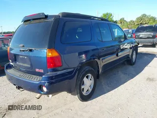 2003 GMC Envoy SLT z VIN 1GKET16S736233956, wystawiony jako IAAI lot #41844351 z przebiegiem 244 942 mil mil oraz . Historia ofert i sprzedaży dostępna na DreamBid. Obrazek 4.
