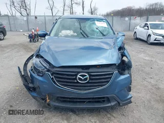 2016 Mazda CX-5 Grand Touring with VIN JM3KE4DY0G0629924, listed as a IAAI auction lot 41878154 with 78,196 mi miles. Bid and sale history available at carsss.com. Image 12.