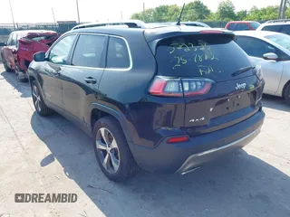 2019 Jeep Cherokee Limited with VIN 1C4PJMDX0KD351884, listed as a IAAI auction lot 42452219 with 112,485 mi miles and . Bid and sale history available at DreamBid. Image 3.