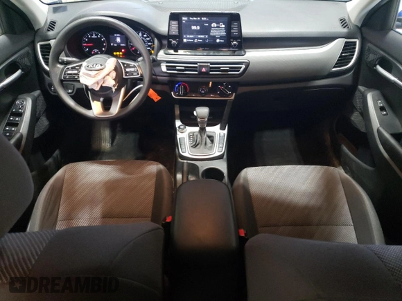 2021 Kia Seltos LX with VIN KNDEPCAA6M7121185, listed as a Copart auction lot 49608255 with 64,896 mi miles and Salvage Title. Bid and sale history available at DreamBid. Image 8.