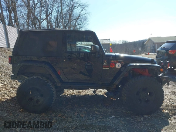 2015 Jeep Wrangler Sahara с VIN 1C4AJWBG7FL703858, выставлен на аукционе IAAI как лот 41720656 с пробегом 110 671 миль миль и . История ставок и продаж доступна на DreamBid. Изображение 14.