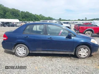 2011 Nissan Versa S with VIN 3N1BC1AP2BL408977, listed as a IAAI auction lot 42524102 with 195,285 mi miles and . Bid and sale history available at DreamBid. Image 13.