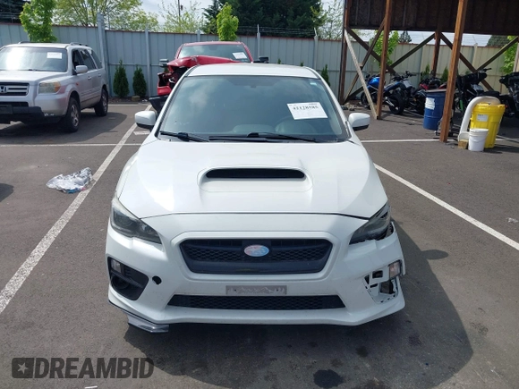 2015 Subaru WRX z VIN JF1VA1A68F9805444, wystawiony jako IAAI lot #42128585 z przebiegiem 86 600 mil mil oraz . Historia ofert i sprzedaży dostępna na DreamBid. Obrazek 13.