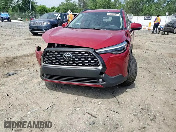 2022 Toyota Corolla Cross XLE with VIN 7MUDAABG5NV005882, listed as a Copart auction lot 56690265 with 6,427 mi miles and Salvage title. Bid and sale history available at DreamBid. Image 14.