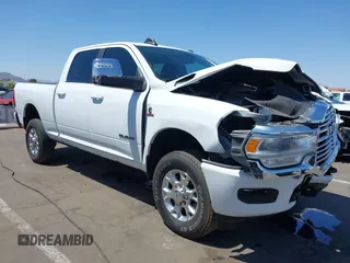 2023 Ram 2500 Laramie with VIN 3C6UR5FL2PG559276, listed as a IAAI auction lot 42281324 with 23,526 mi miles and . Bid and sale history available at DreamBid. Image 1.