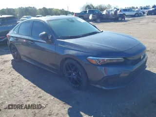 2023 Honda Civic Sport z VIN 2HGFE2F56PH503825, wystawiony jako IAAI lot #41854174 z przebiegiem 54 772 mil mil oraz . Historia ofert i sprzedaży dostępna na DreamBid. Obrazek 1.