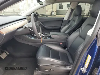 2021 Tesla Model Y Long Range with VIN 5YJYGDEE3MF094165, listed as a Copart auction lot 52907835 with 141,260 mi miles and Salvage Title. Bid and sale history available at DreamBid. Image 7.