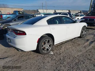 2016 Dodge Charger SXT with VIN 2C3CDXJG4GH259669, listed as a IAAI auction lot 41805408 with 207,187 mi miles. Bid and sale history available at carsss.com. Image 4.