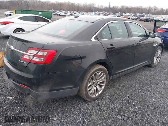2014 Ford Taurus Limited with VIN 1FAHP2F81EG113984, listed as a IAAI auction lot 41542792 with 213,206 mi miles. Bid and sale history available at carsss.com. Image 4.