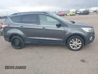 2017 Ford Escape SE with VIN 1FMCU9GD1HUB46034, listed as a IAAI auction lot 41840906 with 143,806 mi miles. Bid and sale history available at carsss.com. Image 13.