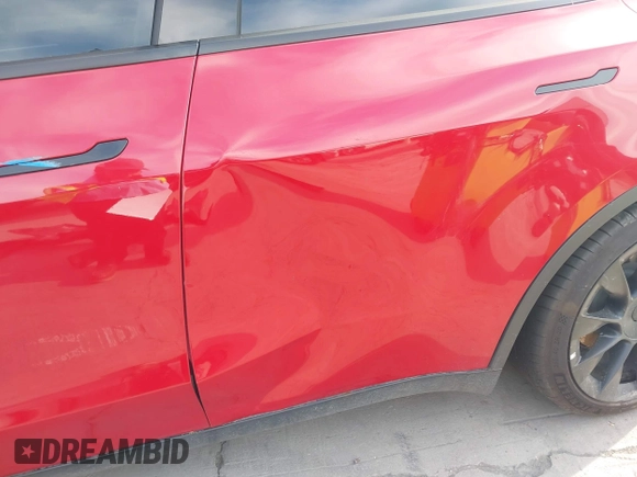 2023 Tesla Model Y Long Range with VIN 7SAYGAEE7PF713761, listed as a IAAI auction lot 41638067 with 46,089 mi miles and . Bid and sale history available at DreamBid. Image 19.