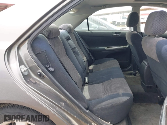 2003 Toyota Camry LE with VIN JTDBE32K530236769, listed as a IAAI auction lot 42250783 with 194,445 mi miles and . Bid and sale history available at DreamBid. Image 8.