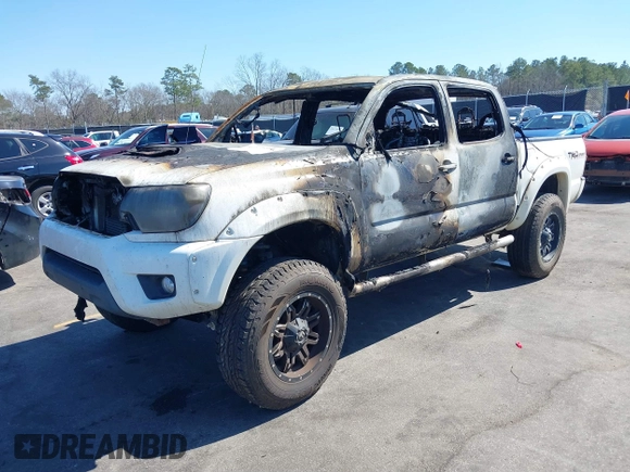 2014 Toyota Tacoma with VIN 5TFLU4EN0EX098815, listed as a IAAI auction lot 41675606 with 89,365 mi miles. Bid and sale history available at carsss.com. Image 2.