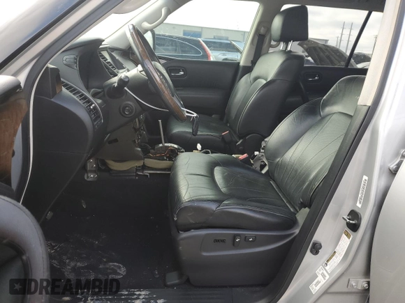 2014 Infiniti QX80 with VIN JN8AZ2NF8E9555594, listed as a Copart auction lot 40000354 with 140,479 mi miles and Salvage title. Bid and sale history available at DreamBid. Image 7.