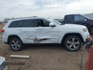 2014 Jeep Grand Cherokee Limited with VIN 1C4RJFBG5EC555128, listed as a IAAI auction lot 42129958 with 98,237 mi miles. Bid and sale history available at carsss.com. Image 13.