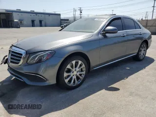 2017 Mercedes-Benz E 300 Luxury with VIN WDDZF4JB9HA222237, listed as a Copart auction lot 61603215 with 107,124 mi miles and Salvage title. Bid and sale history available at DreamBid. Image 1.