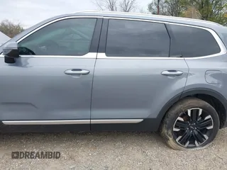 2023 Kia Telluride SX Prestige X-Line z VIN 5XYP5DGCXPG399768, wystawiony jako IAAI lot #41268192 z przebiegiem 19 284 mil mil oraz . Historia ofert i sprzedaży dostępna na DreamBid. Obrazek 15.