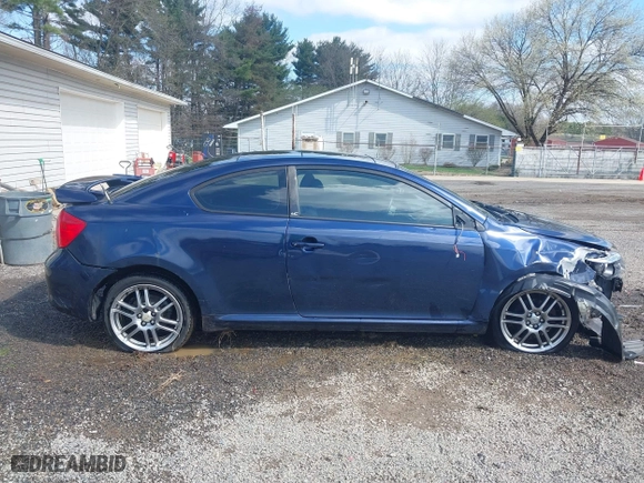 2006 Scion tC with VIN JTKDE177060128395, listed as a IAAI auction lot 41934031 with 181,740 mi miles. Bid and sale history available at carsss.com. Image 14.