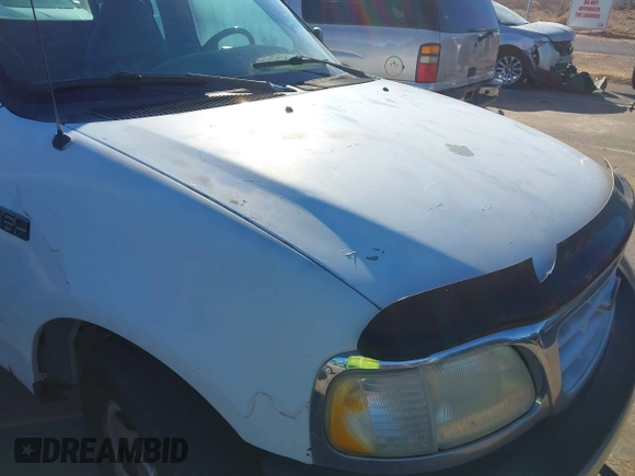 1999 Ford F-150 с VIN 1FTZX1724XKB41653, выставлен на аукционе IAAI как лот 41267645 с пробегом 114 075 миль миль и . История ставок и продаж доступна на DreamBid. Изображение 6.