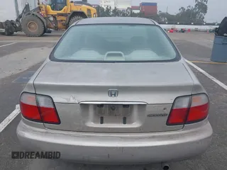 1997 Honda Accord Value with VIN 1HGCD568XVA184006, listed as a IAAI auction lot 41818518 with 276,230 mi miles and . Bid and sale history available at carsss.com. Image 16.