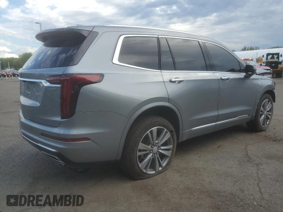 2025 Cadillac XT6 AWD Premium Luxury z VIN 1GYKPDRS8SZ118323, wystawiony jako Copart lot #56156145 z przebiegiem 12 406 mil mil oraz Tytuł czysty. Historia ofert i sprzedaży dostępna na DreamBid. Obrazek 3.