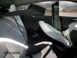 2024 Tesla Model Y Performance z VIN 7SAYGDEF6RF166365, wystawiony jako Copart lot #48885585 z przebiegiem Nie podano mil oraz Szkoda całkowita • Salvage title. Historia ofert i sprzedaży dostępna na DreamBid. Obrazek 10.