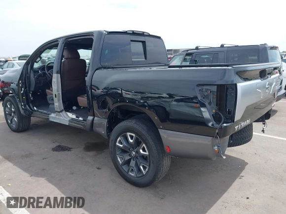 2021 Nissan Titan Pro-4X with VIN 1N6AA1ED8MN529124, listed as a IAAI auction lot 42212989 with 63,652 mi miles and . Bid and sale history available at DreamBid. Image 3.