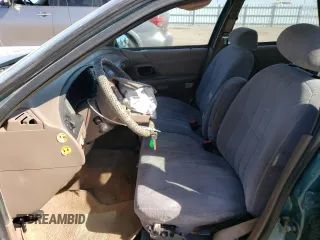 1993 Ford Taurus z VIN 1FACP5746PA162644, wystawiony jako Copart lot #74177004 z przebiegiem 37 125 mil mil oraz Czysty tytuł • Clean title. Historia ofert i sprzedaży dostępna na DreamBid. Obrazek 7.