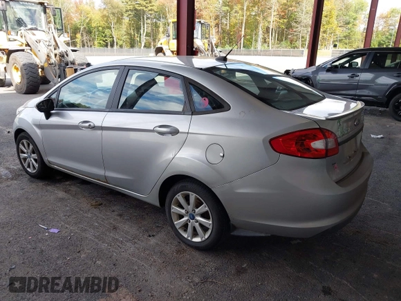 2013 Ford Fiesta SE with VIN 3FADP4BJ3DM173949, listed as a IAAI auction lot 40494276 with 141,061 mi miles. Bid and sale history available at carsss.com. Image 3.