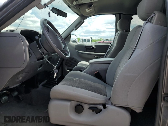 2004 Ford F-150 XL with VIN 2FTRX17274CA98376, listed as a Copart auction lot 56300585 with 71,767 mi miles and Salvage title. Bid and sale history available at DreamBid. Image 7.