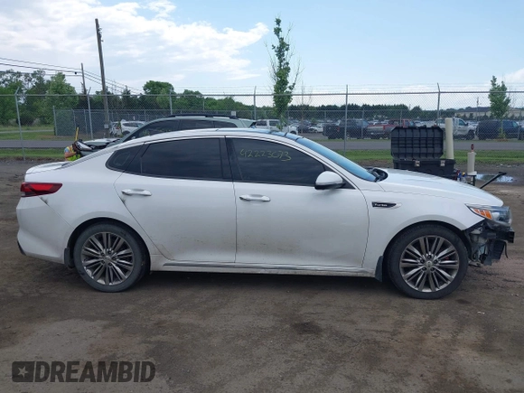 2016 Kia Optima SXL Turbo with VIN 5XXGV4L26GG067859, listed as a IAAI auction lot 42223073 with 133,511 mi miles and . Bid and sale history available at DreamBid. Image 13.